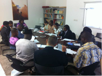 Dr. Uju Agomoh, Executive Director of PRAWA, facilitates a meeting at the Swiss Embassy with leading civil society organizations on police reform.